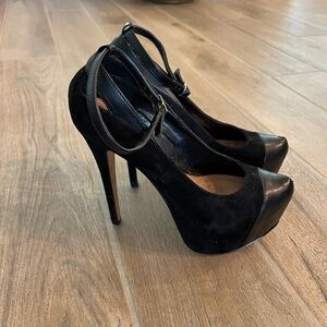 Melanie Black Suede Platform Pumps designed and manufactured by Halston